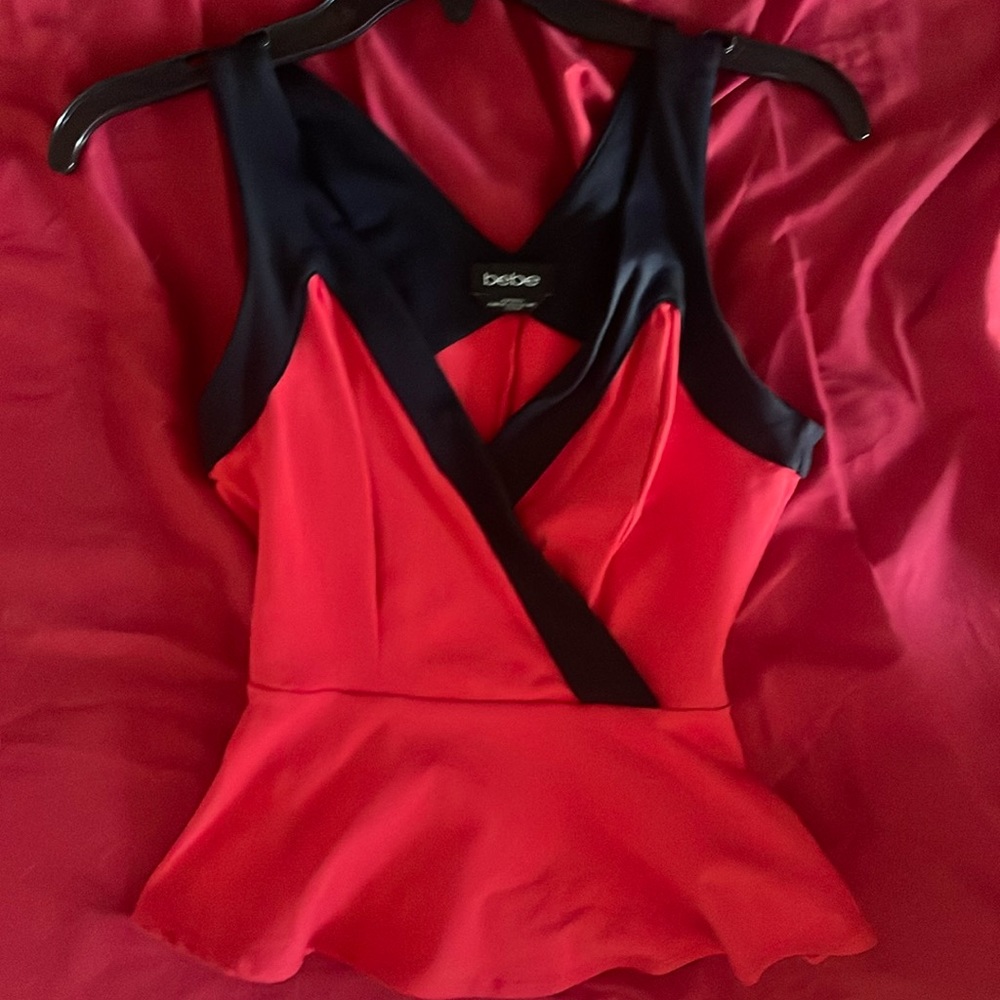 Bebe Peplum top red and black XXS